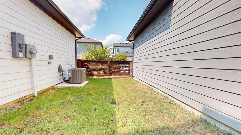 side fenced yard.