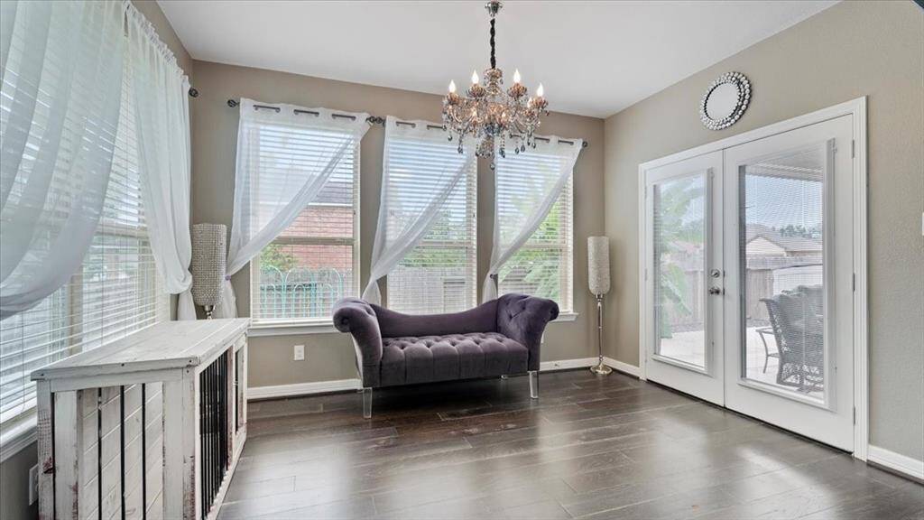 The stylish sitting area provides ample space for comfortable seating, creating a serene and inviting spot—perfect for relaxation or intimate gatherings.