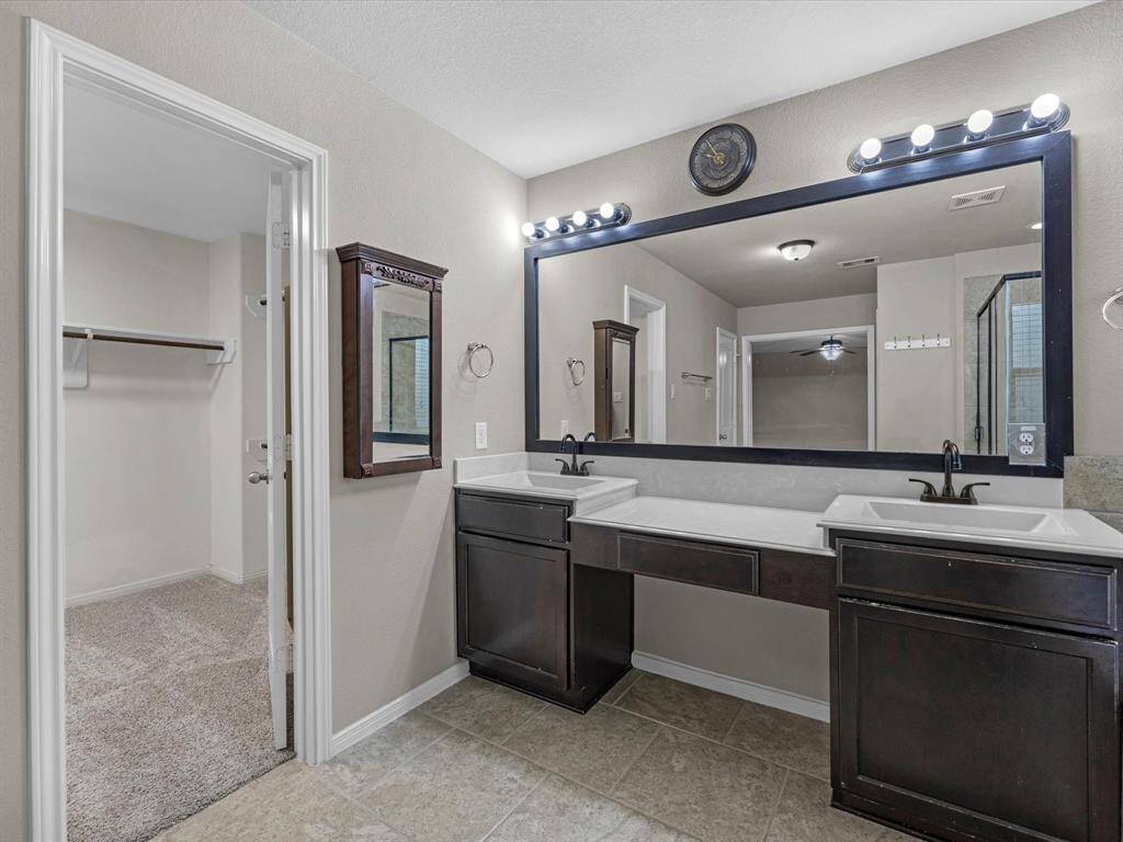 Double sinks in the primary bathroom.
