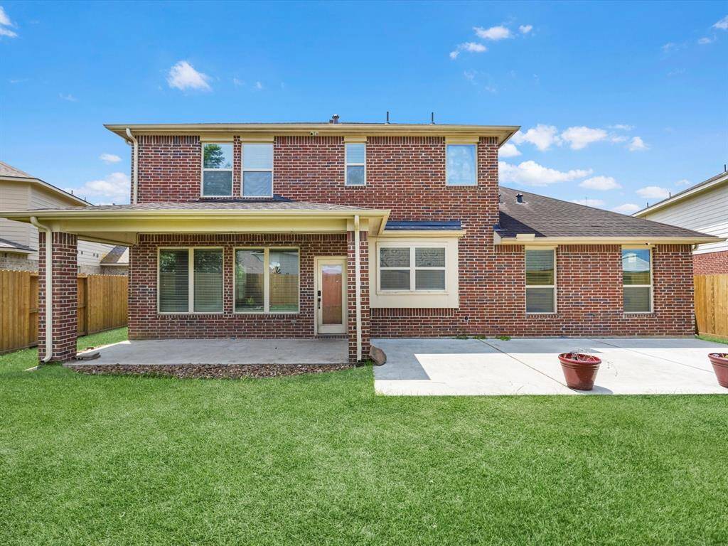 Spacious backyard with a beautiful covered and uncovered patio space!