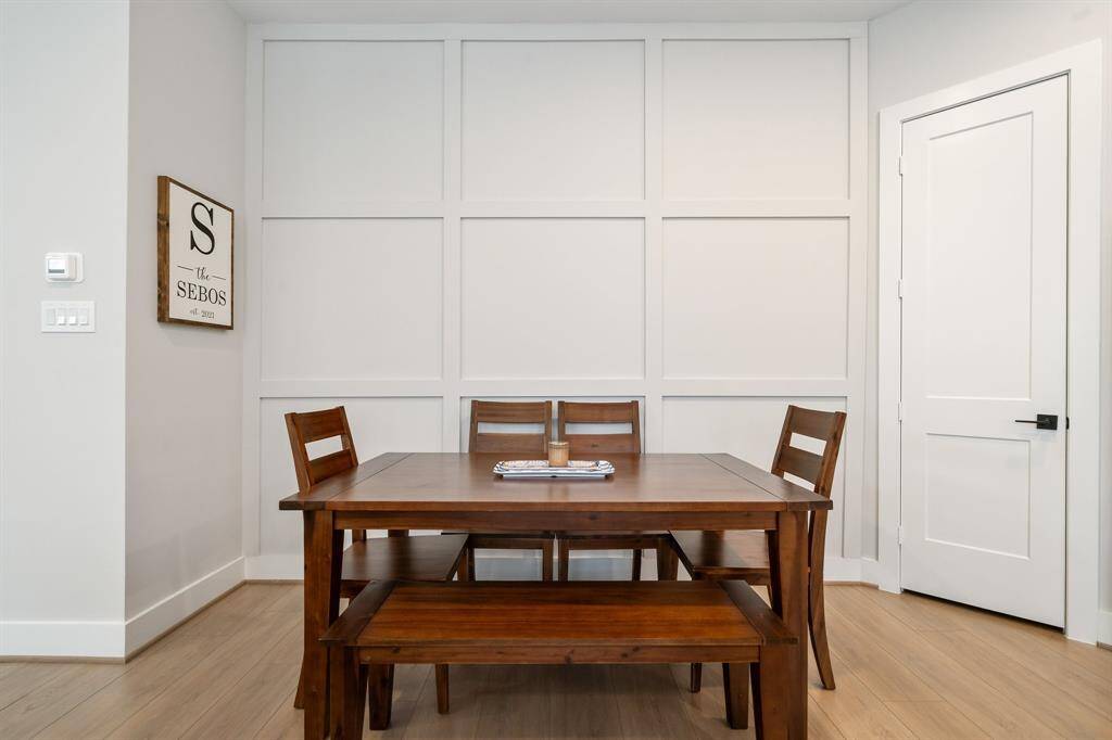 Custom woodwork makes a nice accent wall in the breakfast room.