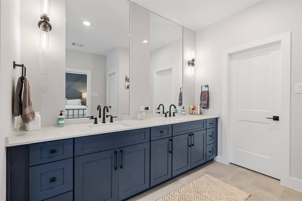 Gorgeous primary bathroom with double sinks.