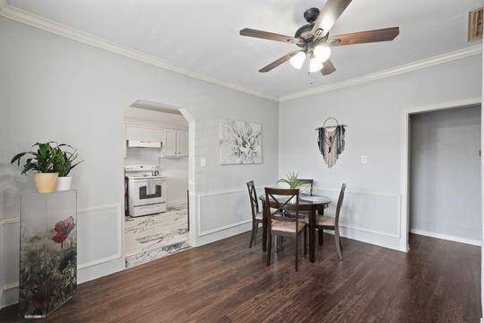 Dining area leading to the hallway and kitchen