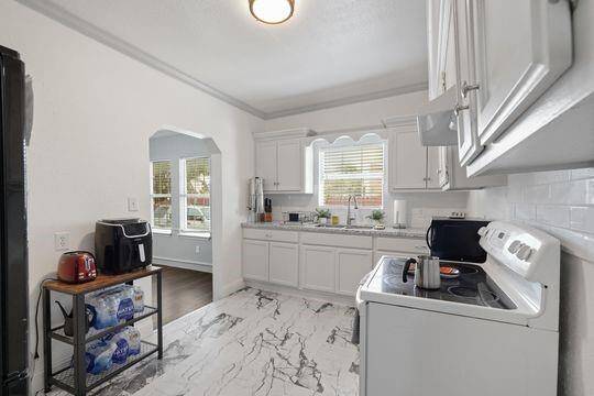 Another view of the kitchen