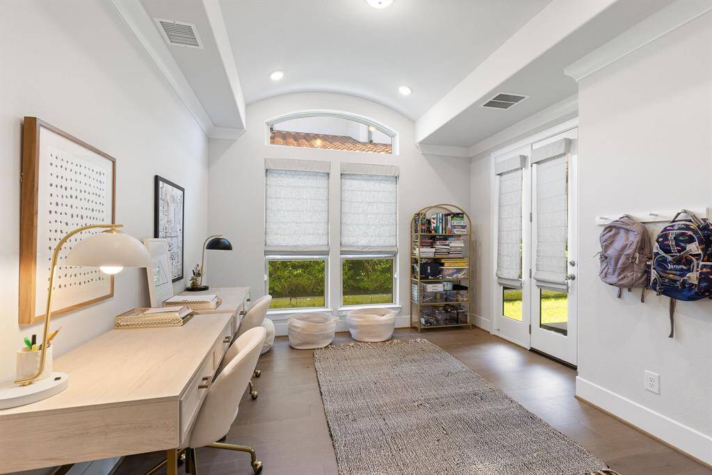 Study that opens up to the back patio.