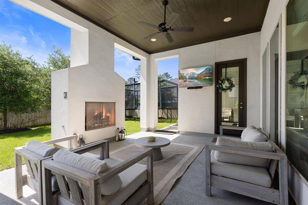 Outdoor patio with fireplace.