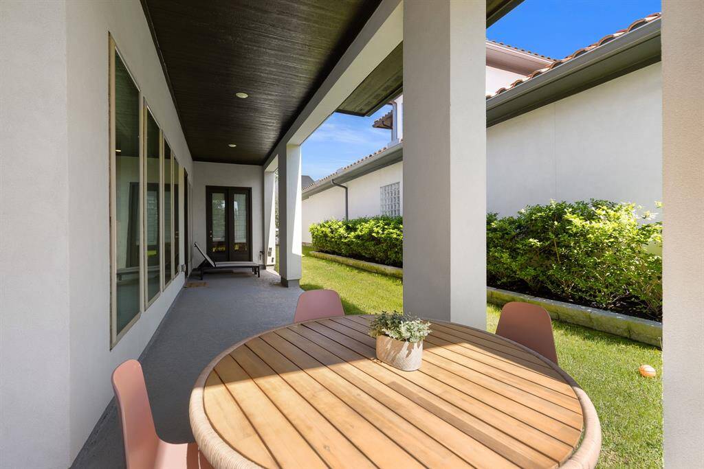 Back patio opens to the study, living and sunroom.