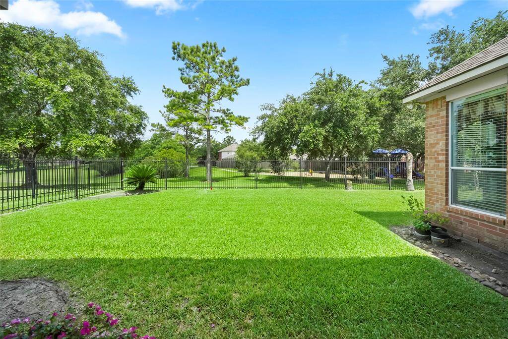Home backs to green belt.
