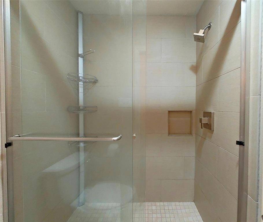 Here we see the nicely updated and spacious walk-in shower!