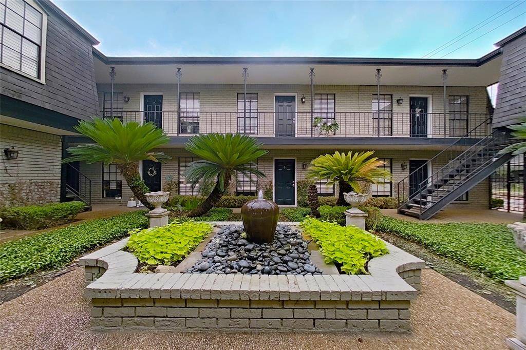 A stunning and well-maintained interior courtyard greets you upon entrance to this beloved community!