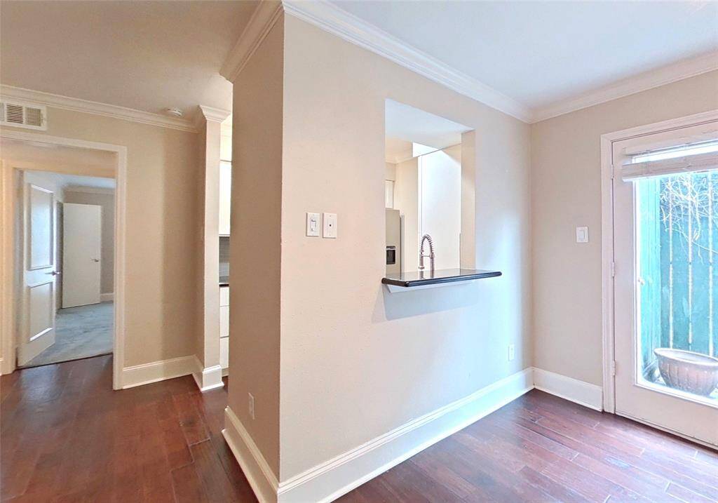 The doors off of the dining area lead to your very own private patio! The interior courtyard is a great spot to gather, but sometimes it's nice to have a space to yourself. It's also convenient for a pet that may need a little outside break!