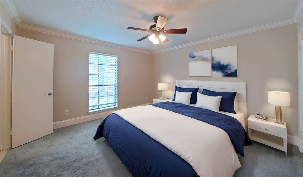 The bedroom is oversized and perfect for relaxing! Photo is virtually staged.