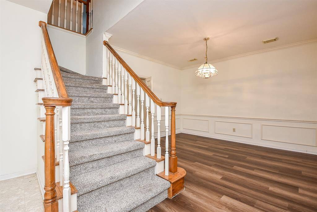 Staircase leading up to the second story; this is the only carpeted area in the house.