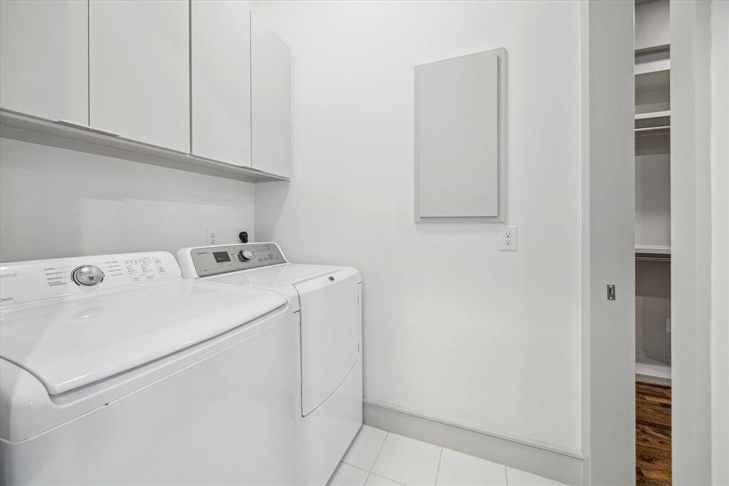Utility room, washer & dryer to remain. Has access to Primary closet.