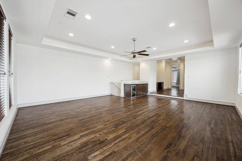 Game Room, family room, den .. a third floor living space with wet bar and opens to a stunning covered Terrace.