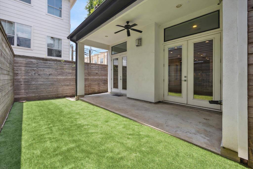 New landscape design in this backyard with turf lawn,.