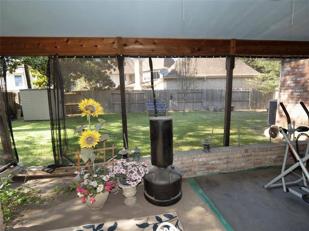 Covered patio with back yard view