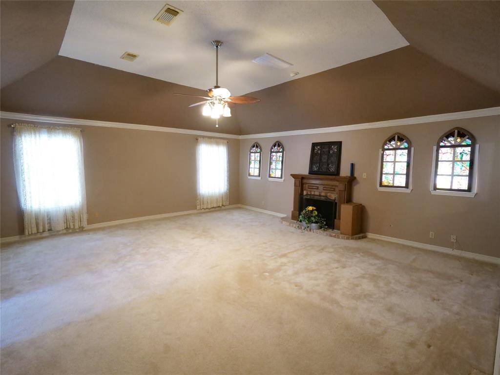 Spacious Primary Bedroom with vaulted ceiling