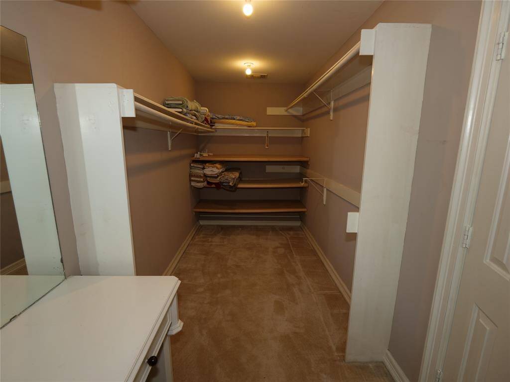 One of the his/her primary walk-in closet