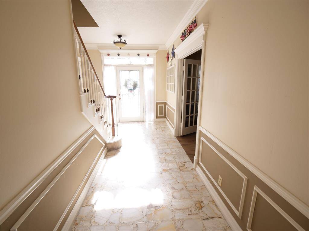 A view of the entry way from the kitchen