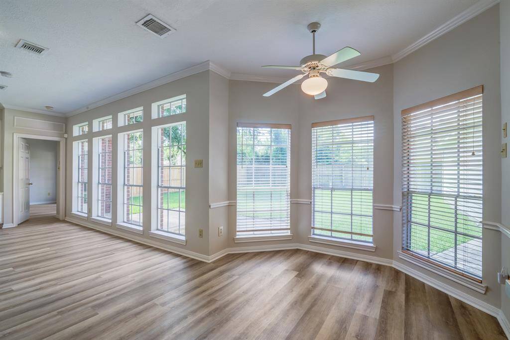 Huge windows along the rear of the living space over looking the yard. Lots of natural light.