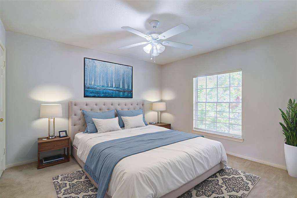 Virtually Staged. One of three second level bedrooms.