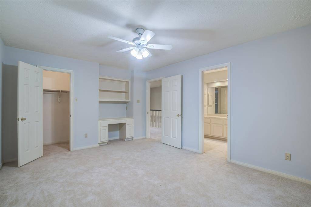 Large guest bedroom with built in desk space perfect for homework, or work from home. En suite bathroom and large closet.