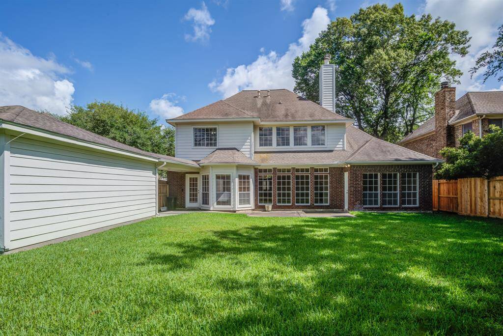 Lush green space in this fully fenced yard. Room for pets, kids to play, or build your dream pool/spa.