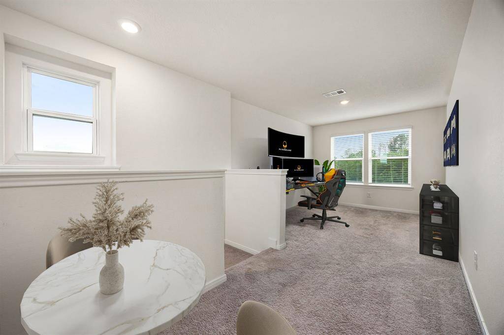 Come upstairs and enjoy the wonderful landing area featuring plush carpet floors, recessed lighting and windows bringing in a lot of natural light. *virtual staging*