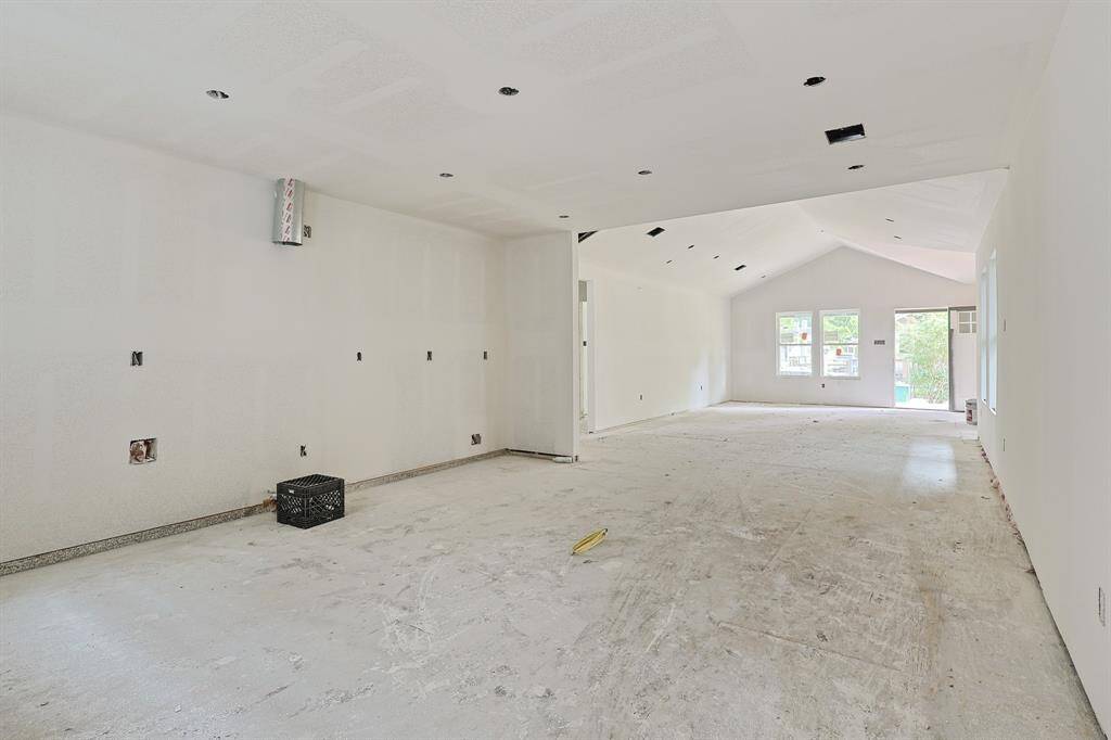 Progress as of June 2025 This sheetrocked space will soon be the heart of the home—a modern, open-concept kitchen overlooking the living room. Designed for connection and functionality, the layout allows for a seamless flow between cooking, dining, and entertaining. A blank canvas ready to be transformed into a dream culinary space!