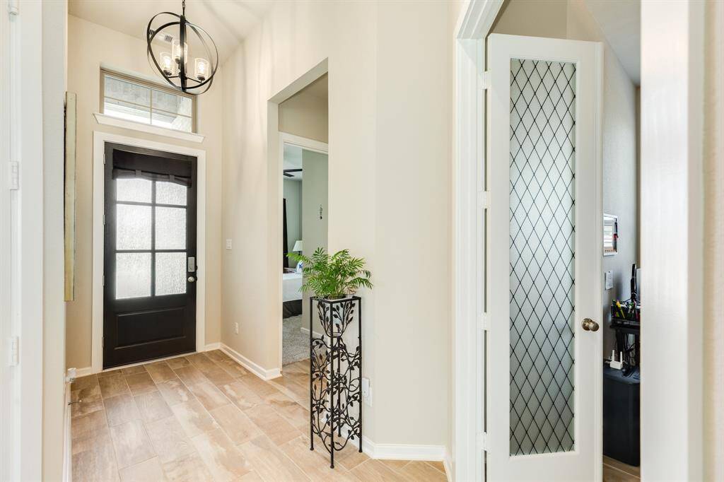 One bedroom and bathroom on the left as you enter through the elegant front door.