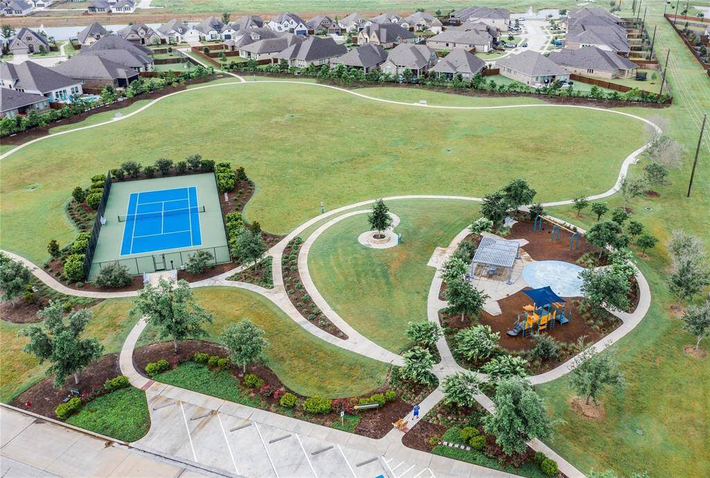 splash pad , tennis courts walking paths and picnic area