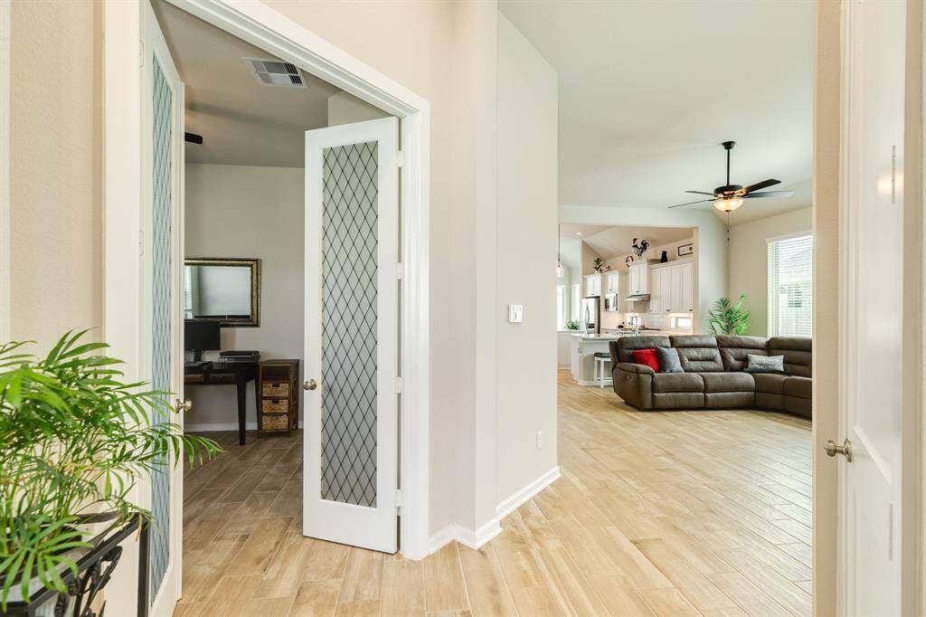 the fourth bedroom, is being used as an  office would also be ideal for older children or younger teens who prefer more privacy or are visiting relatives or parents.