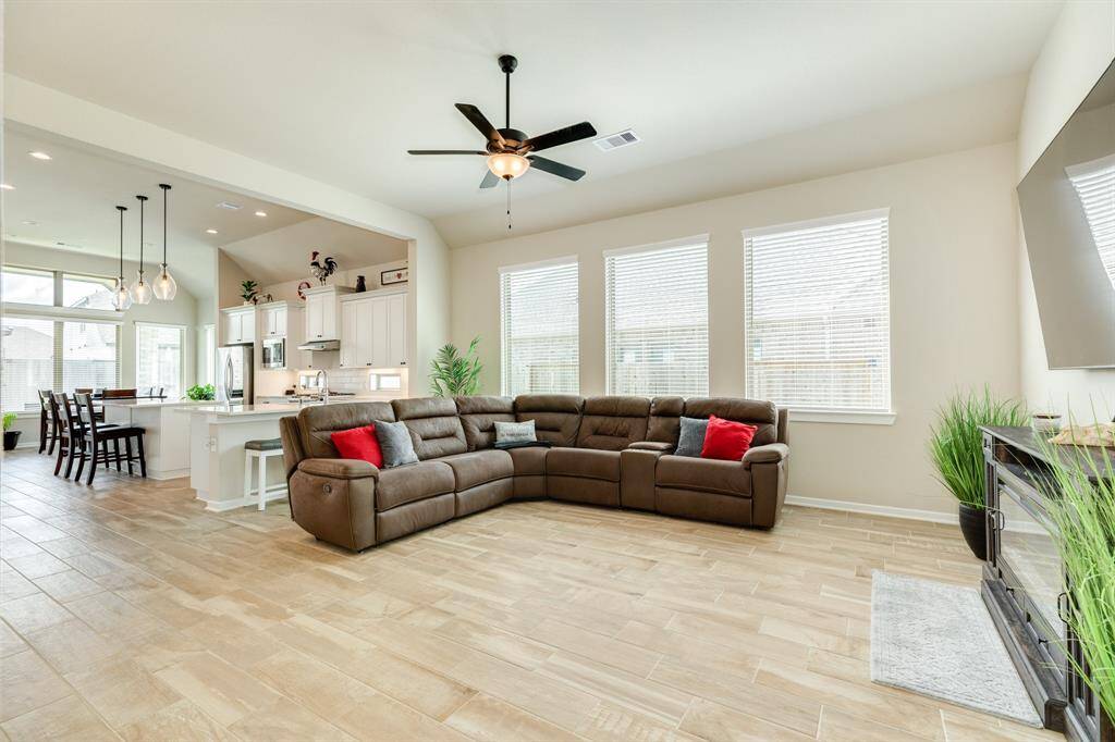 Open floor plan, the tile flooring adds interest and personality to your home perfect for any room, especially the kitchen and dining area add style and elegance to your home.