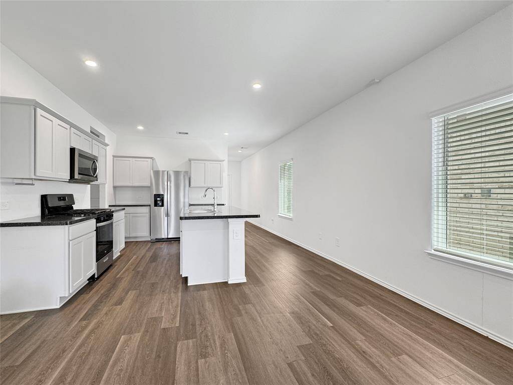 View of dining area and kitchen