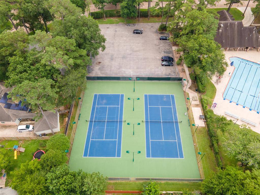 Tennis courts next to the clubhouse & Pool.