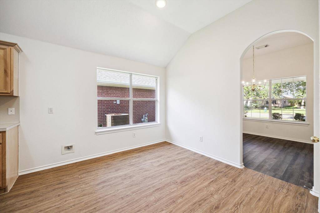 The kitchen is bright and inviting with abundant light that makes perfect space for cooking and gathering