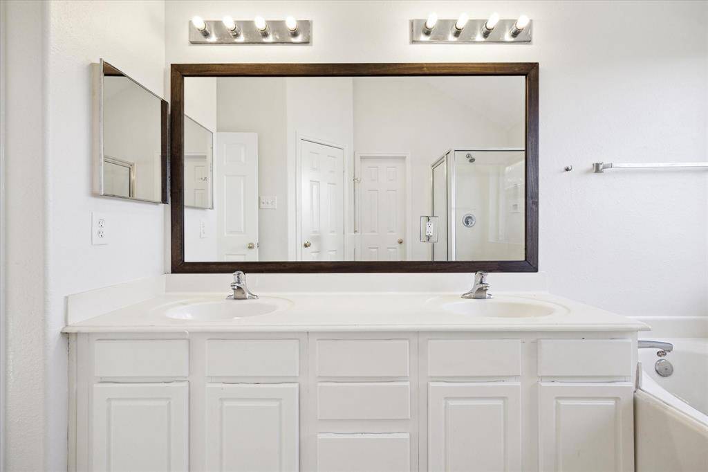 the en-suite bathroom is bright and spotless