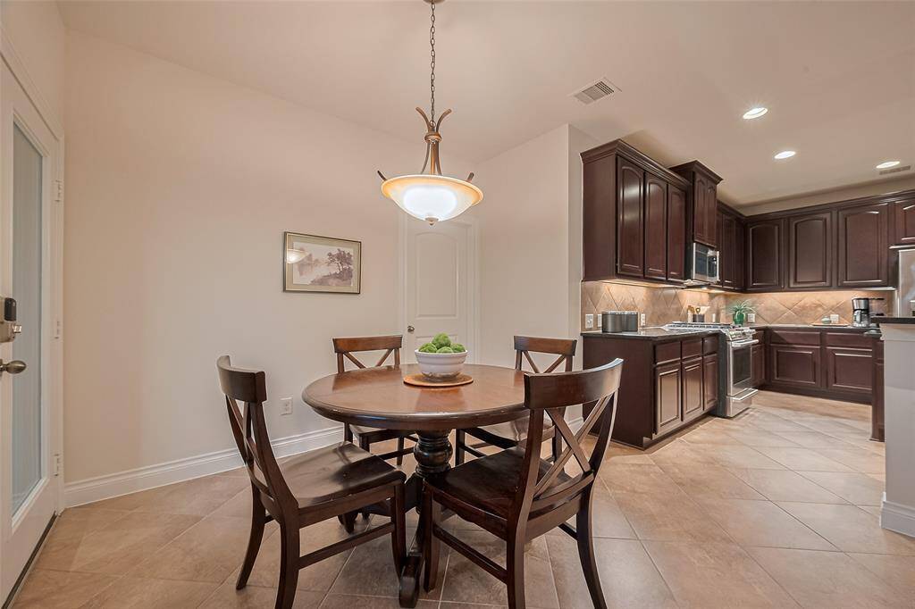 Tucked behind the central door in the photo is a spacious utility room, thoughtfully positioned away from the main living areas for added convenience and privacy