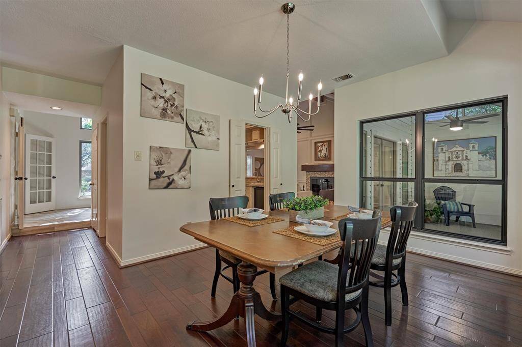 Between Dining room and Kitchen is hallway to Half Bath and Storage closet.