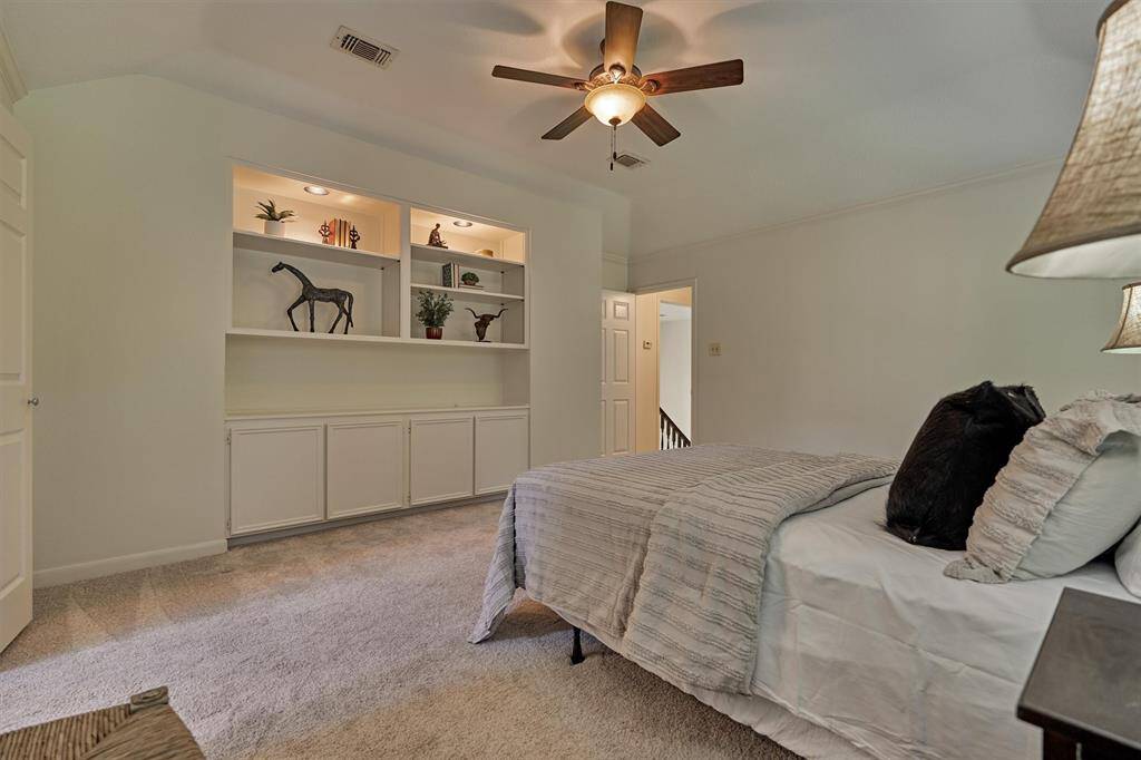 Primary Bedroom with built-ins.