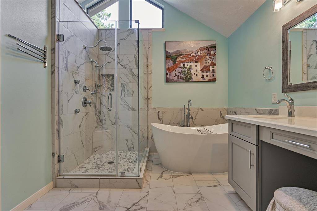 Relax and refresh - soaking tub and stunning shower.