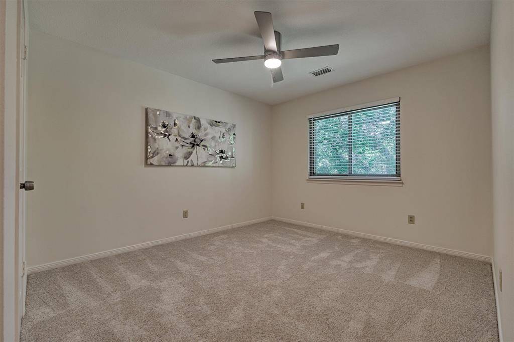 Bedroom #2. Upstairs next to Secondary Bath. Window to backyard. Upstairs.