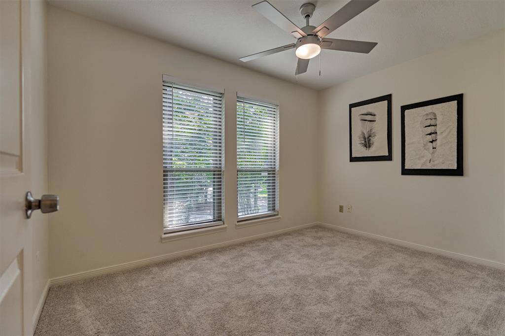 Bedroom #4. Windows to front of home. Smallest of bedrooms. Could also be a second office, nursery, playroom. Upstairs.