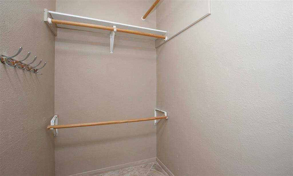Walk-in closet in the primary