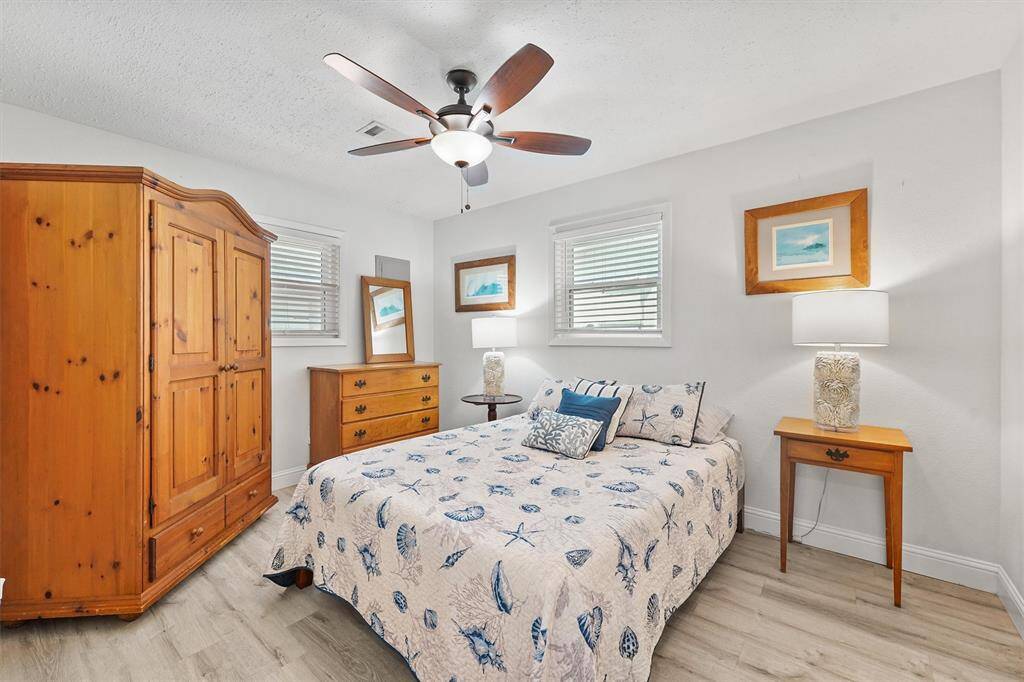 Light-filled secondary bedroom with clean finishes and a serene feel—perfect for guests, kids, or a personalized retreat.