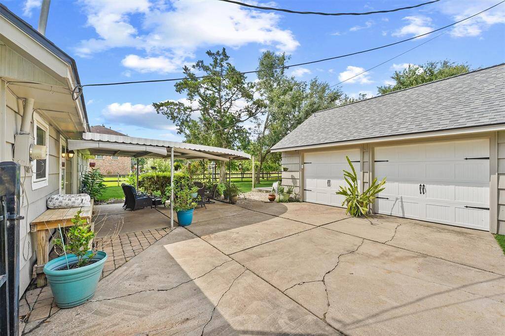 Detached two-car garage offering secure parking, additional storage space, and convenient access to the home.