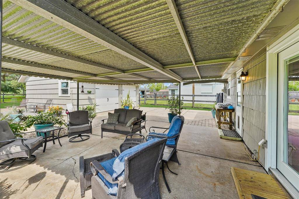 Relax or entertain year-round under the spacious covered patio—perfect for morning coffee or evening wine with a view.