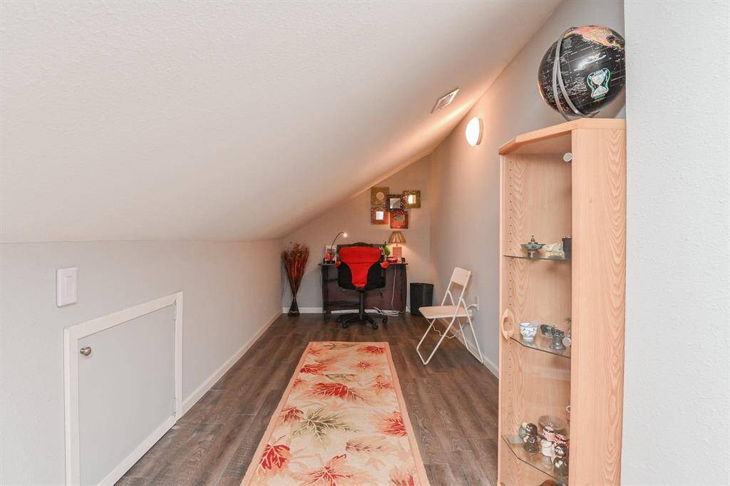 The bonus room is currently used as an office.