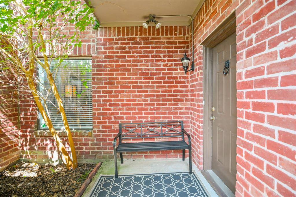 This unit has a gated atrium for privacy.